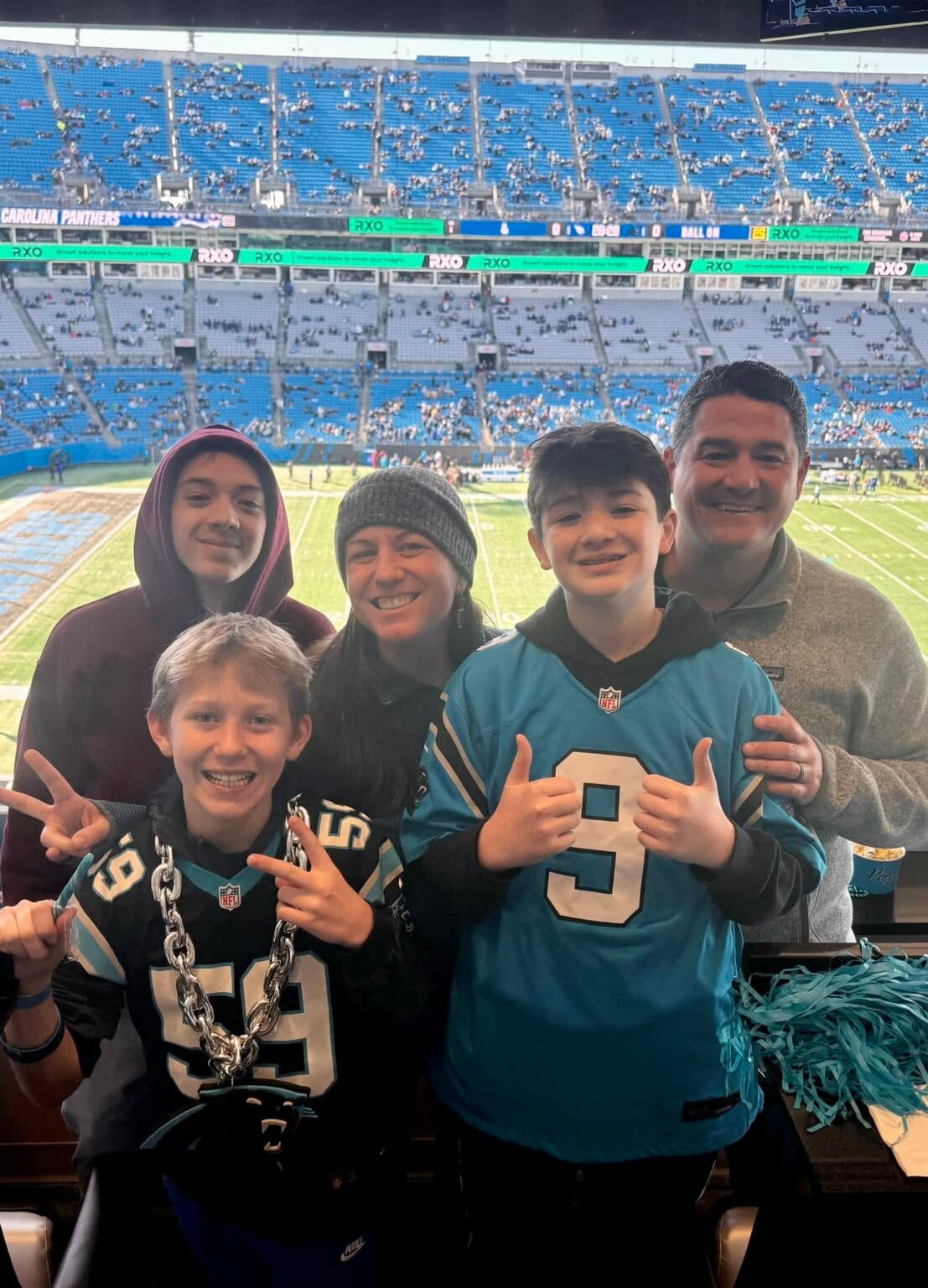 Rachel with family at Panthers game